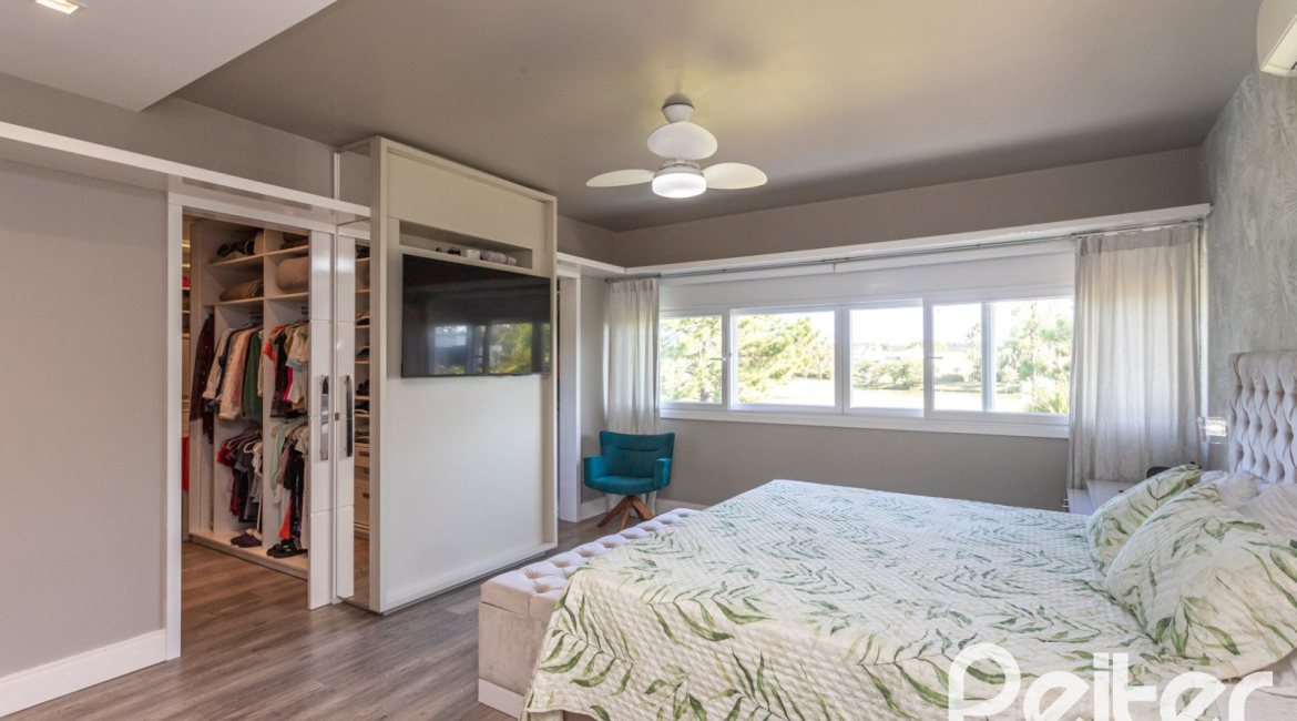 Casa em Condomínio à venda com 478m², 4 dormitórios, 4 suítes, 4 vagas, no bairro Terra Ville em PORTO ALEGRE