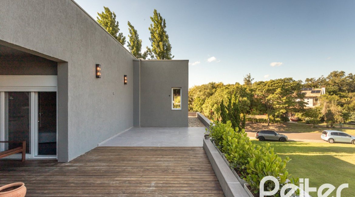 Casa em Condomínio à venda com 478m², 4 dormitórios, 4 suítes, 4 vagas, no bairro Terra Ville em PORTO ALEGRE