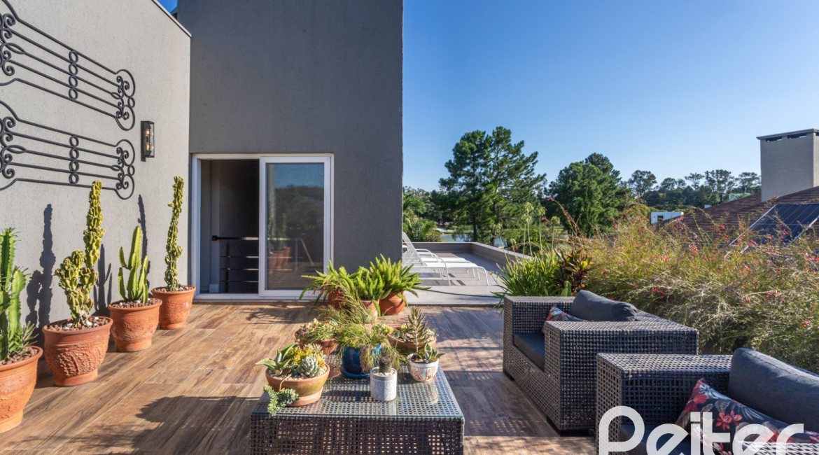 Casa em Condomínio à venda com 478m², 4 dormitórios, 4 suítes, 4 vagas, no bairro Terra Ville em PORTO ALEGRE