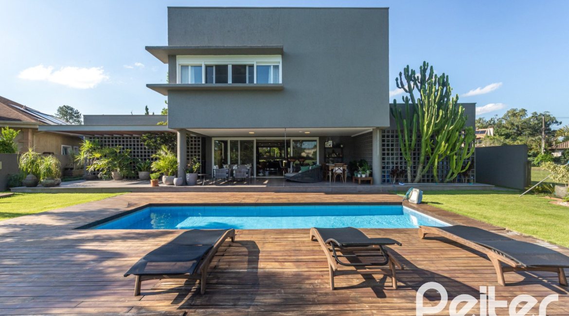 Casa em Condomínio à venda com 478m², 4 dormitórios, 4 suítes, 4 vagas, no bairro Terra Ville em PORTO ALEGRE