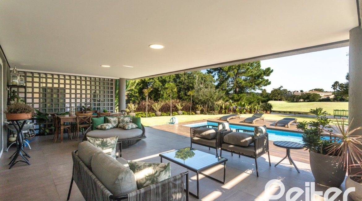 Casa em Condomínio à venda com 478m², 4 dormitórios, 4 suítes, 4 vagas, no bairro Terra Ville em PORTO ALEGRE