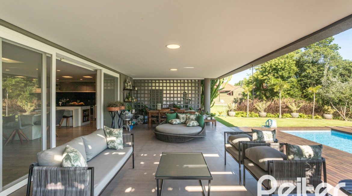 Casa em Condomínio à venda com 478m², 4 dormitórios, 4 suítes, 4 vagas, no bairro Terra Ville em PORTO ALEGRE