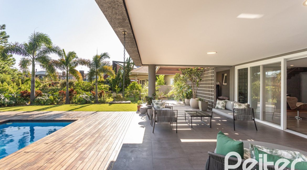 Casa em Condomínio à venda com 478m², 4 dormitórios, 4 suítes, 4 vagas, no bairro Terra Ville em PORTO ALEGRE