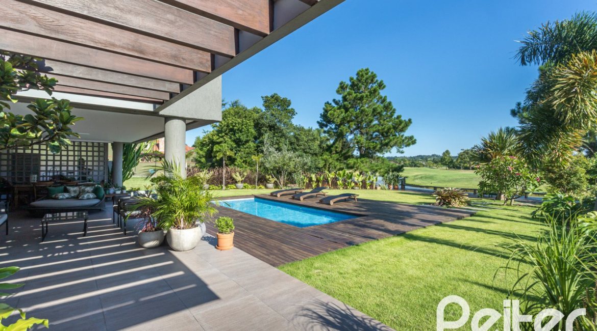 Casa em Condomínio à venda com 478m², 4 dormitórios, 4 suítes, 4 vagas, no bairro Terra Ville em PORTO ALEGRE