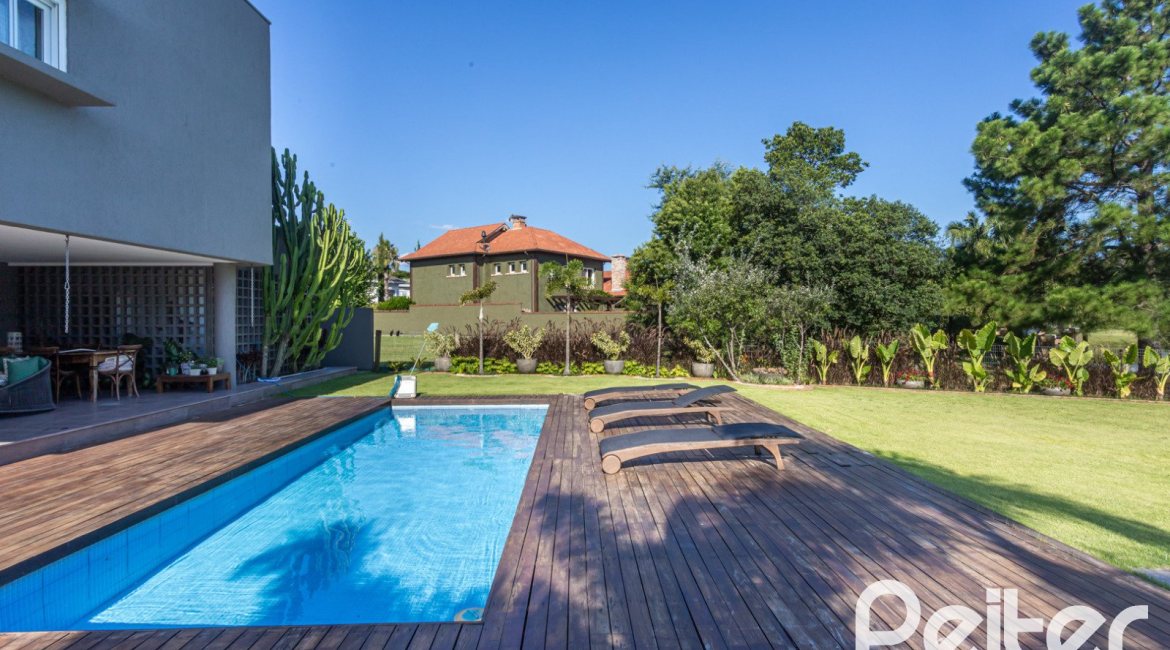 Casa em Condomínio à venda com 478m², 4 dormitórios, 4 suítes, 4 vagas, no bairro Terra Ville em PORTO ALEGRE
