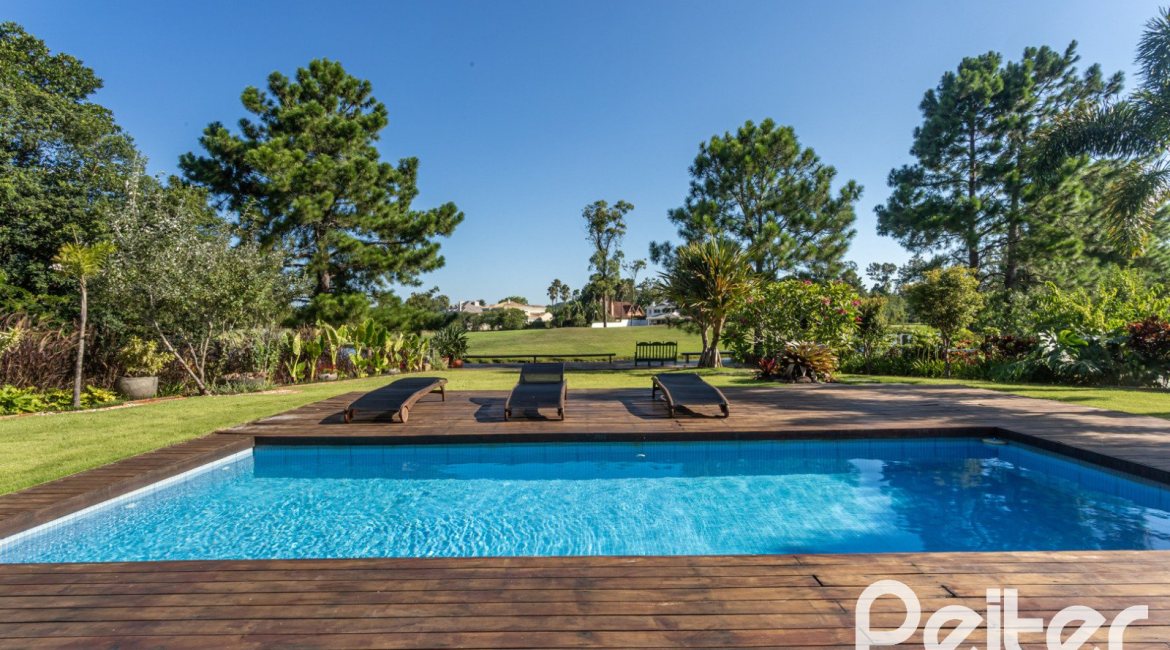 Casa em Condomínio à venda com 478m², 4 dormitórios, 4 suítes, 4 vagas, no bairro Terra Ville em PORTO ALEGRE