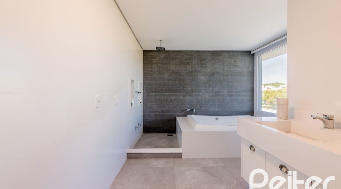 Casa em Condomínio à venda com 363m², 3 dormitórios, 3 suítes, 4 vagas, no bairro Terra Ville em PORTO ALEGRE