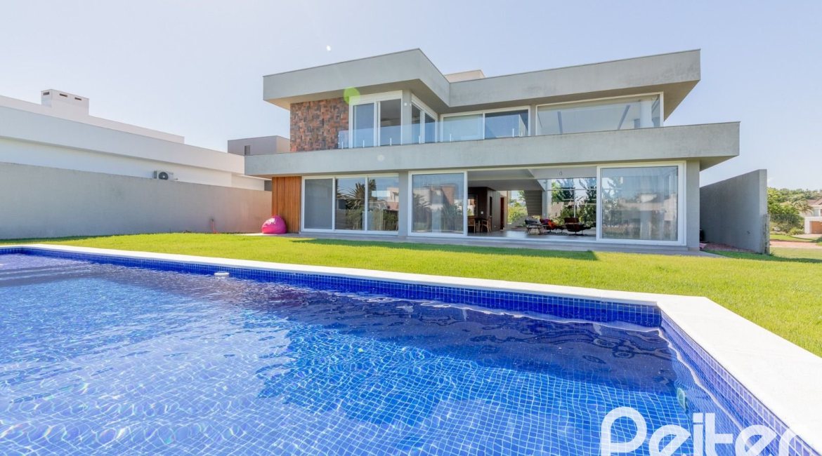 Casa em Condomínio à venda com 363m², 3 dormitórios, 3 suítes, 4 vagas, no bairro Terra Ville em PORTO ALEGRE