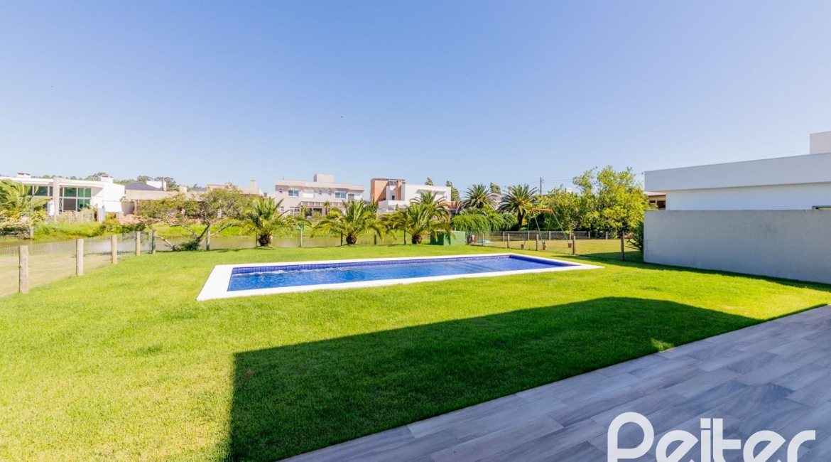 Casa em Condomínio à venda com 363m², 3 dormitórios, 3 suítes, 4 vagas, no bairro Terra Ville em PORTO ALEGRE