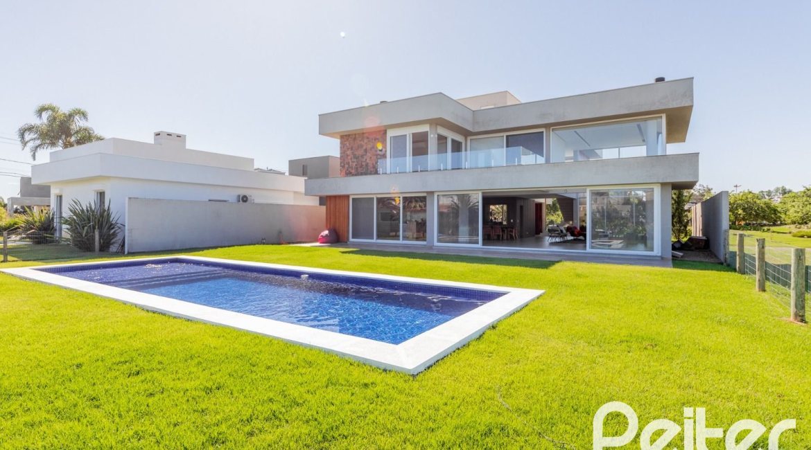 Casa em Condomínio à venda com 363m², 3 dormitórios, 3 suítes, 4 vagas, no bairro Terra Ville em PORTO ALEGRE