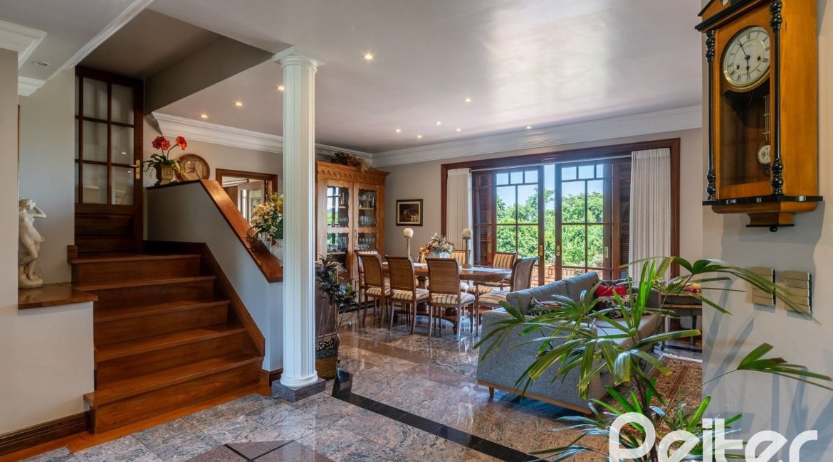 Casa em Condomínio à venda com 459m², 4 dormitórios, 4 suítes, 3 vagas, no bairro Cavalhada em PORTO ALEGRE