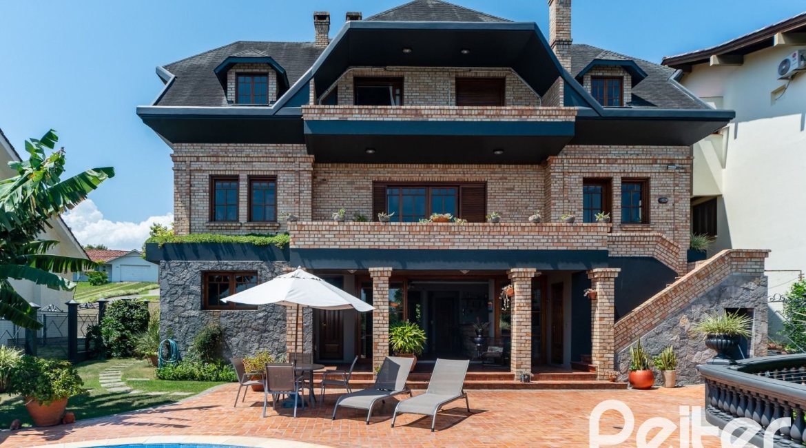Casa em Condomínio à venda com 459m², 4 dormitórios, 4 suítes, 3 vagas, no bairro Cavalhada em PORTO ALEGRE