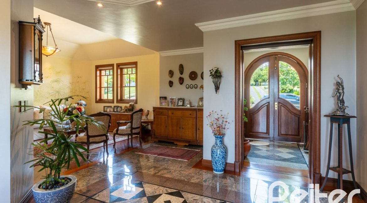 Casa em Condomínio à venda com 459m², 4 dormitórios, 4 suítes, 3 vagas, no bairro Cavalhada em PORTO ALEGRE