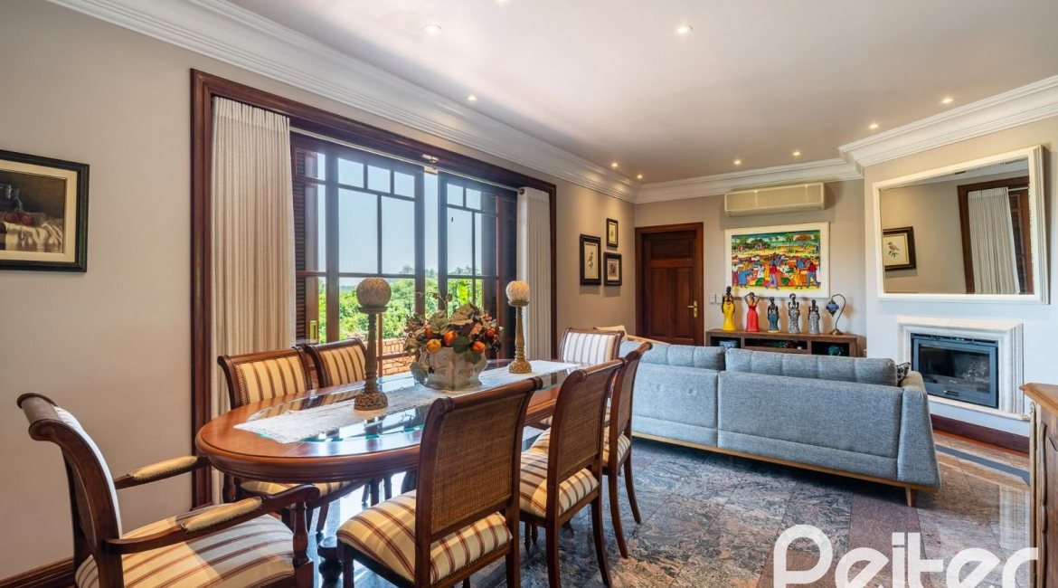 Casa em Condomínio à venda com 459m², 4 dormitórios, 4 suítes, 3 vagas, no bairro Cavalhada em PORTO ALEGRE