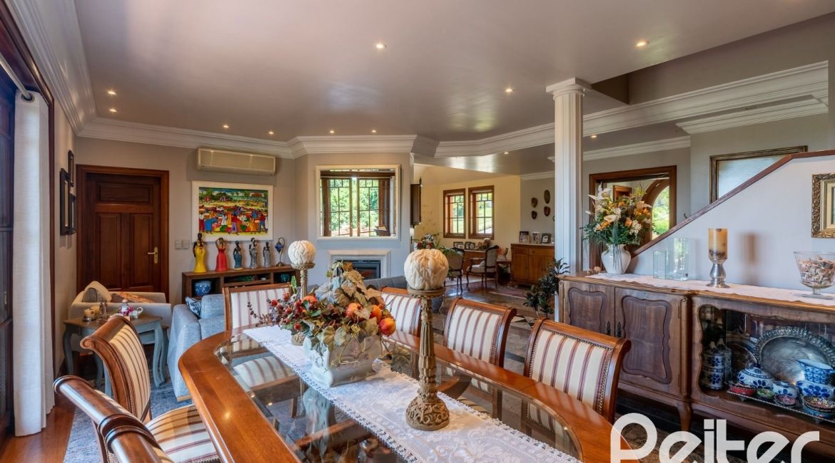 Casa em Condomínio à venda com 459m², 4 dormitórios, 4 suítes, 3 vagas, no bairro Cavalhada em PORTO ALEGRE