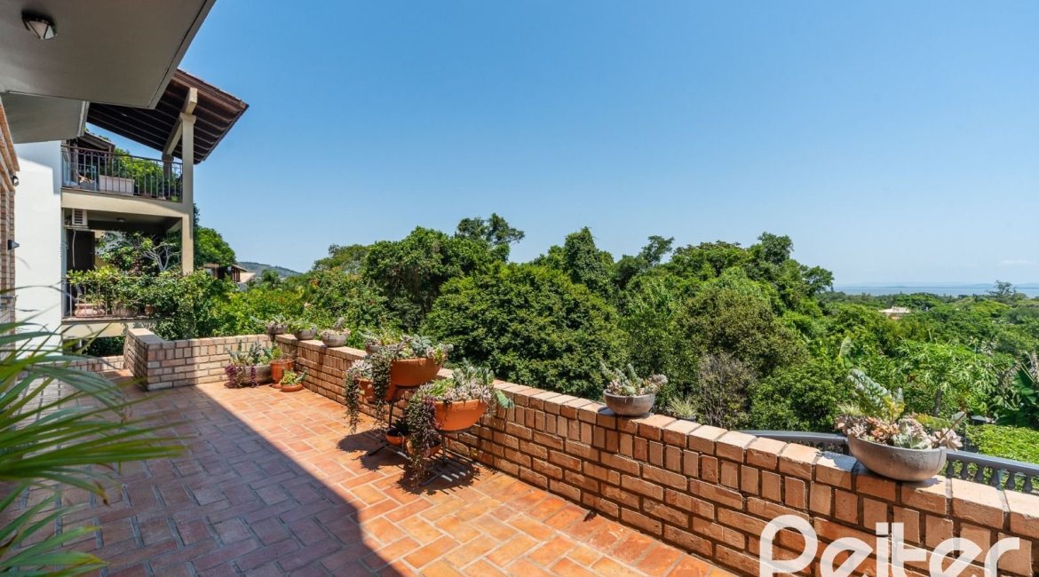 Casa em Condomínio à venda com 459m², 4 dormitórios, 4 suítes, 3 vagas, no bairro Cavalhada em PORTO ALEGRE