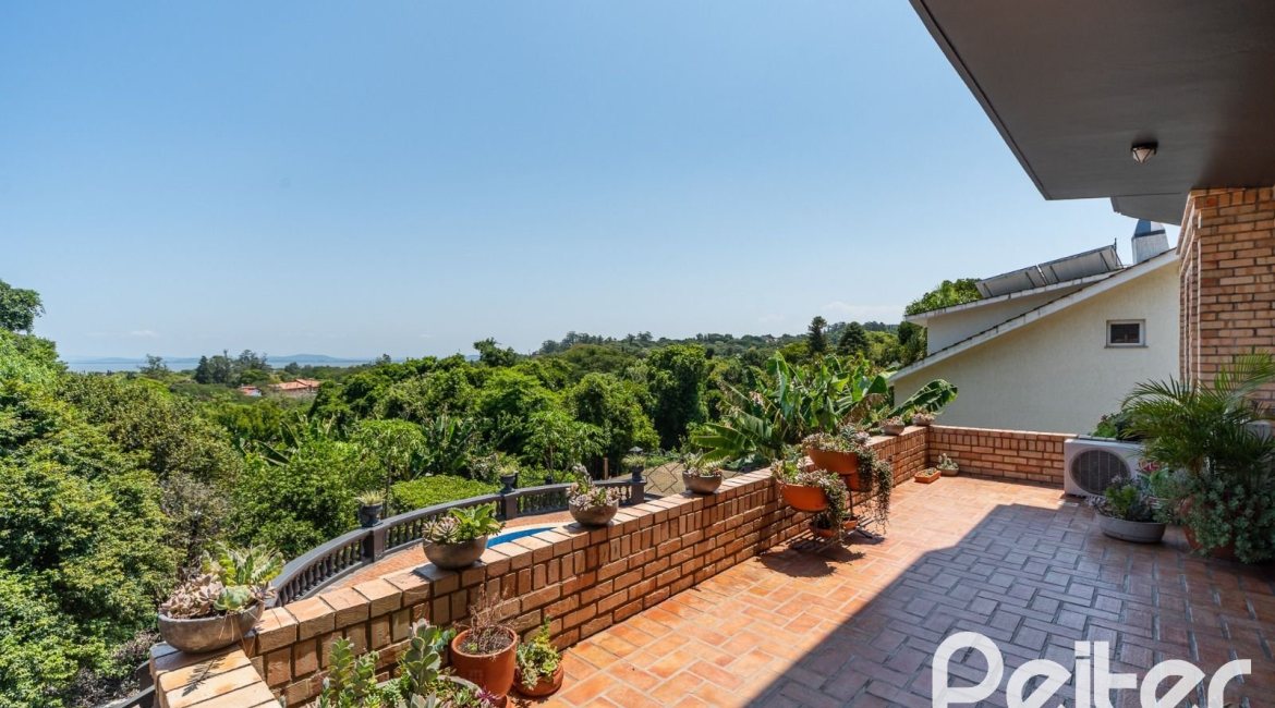 Casa em Condomínio à venda com 459m², 4 dormitórios, 4 suítes, 3 vagas, no bairro Cavalhada em PORTO ALEGRE