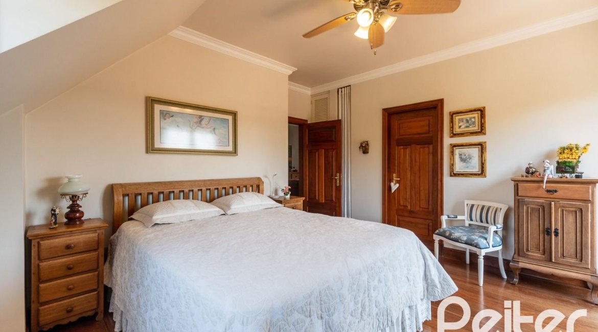 Casa em Condomínio à venda com 459m², 4 dormitórios, 4 suítes, 3 vagas, no bairro Cavalhada em PORTO ALEGRE