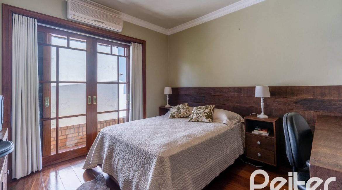 Casa em Condomínio à venda com 459m², 4 dormitórios, 4 suítes, 3 vagas, no bairro Cavalhada em PORTO ALEGRE