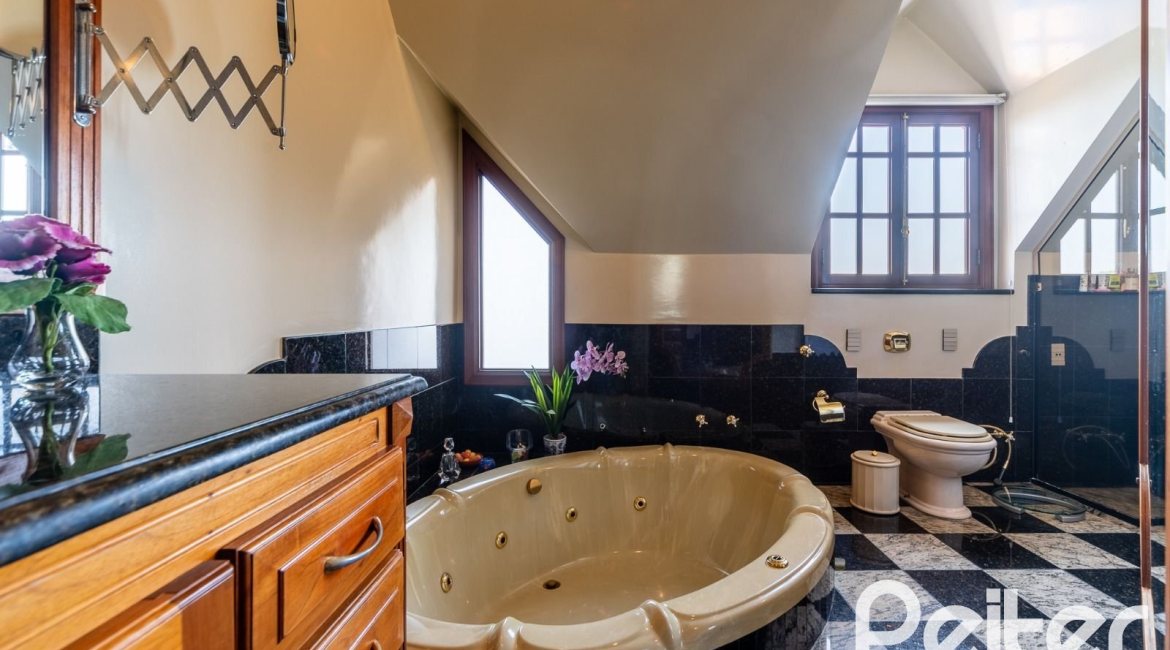 Casa em Condomínio à venda com 459m², 4 dormitórios, 4 suítes, 3 vagas, no bairro Cavalhada em PORTO ALEGRE