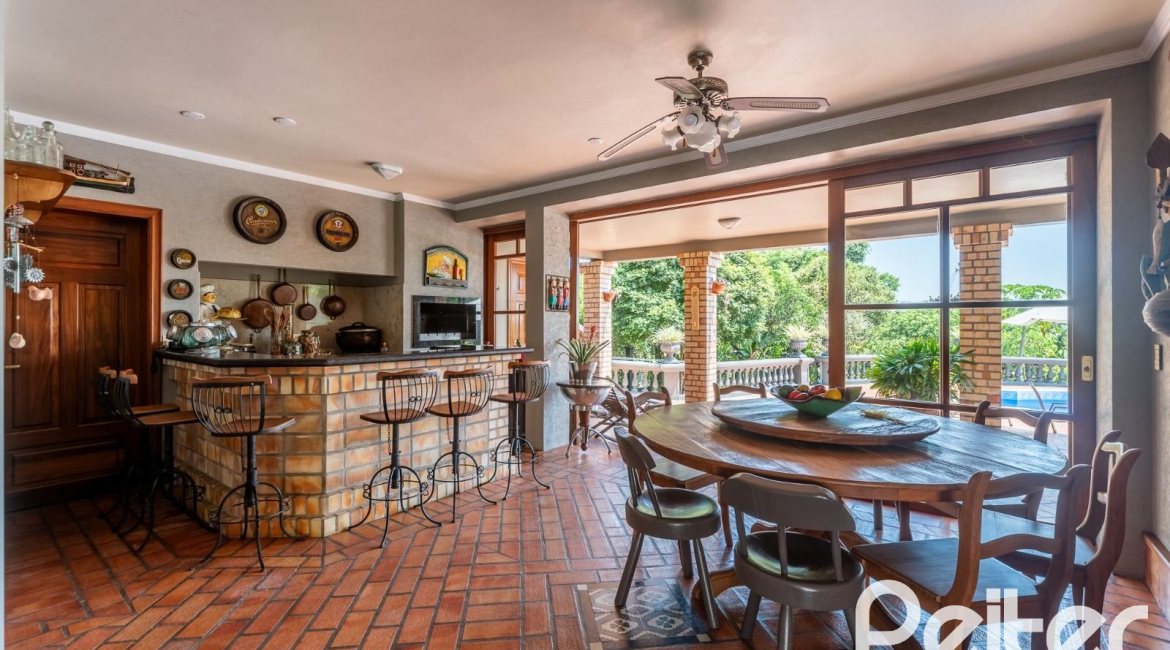 Casa em Condomínio à venda com 459m², 4 dormitórios, 4 suítes, 3 vagas, no bairro Cavalhada em PORTO ALEGRE