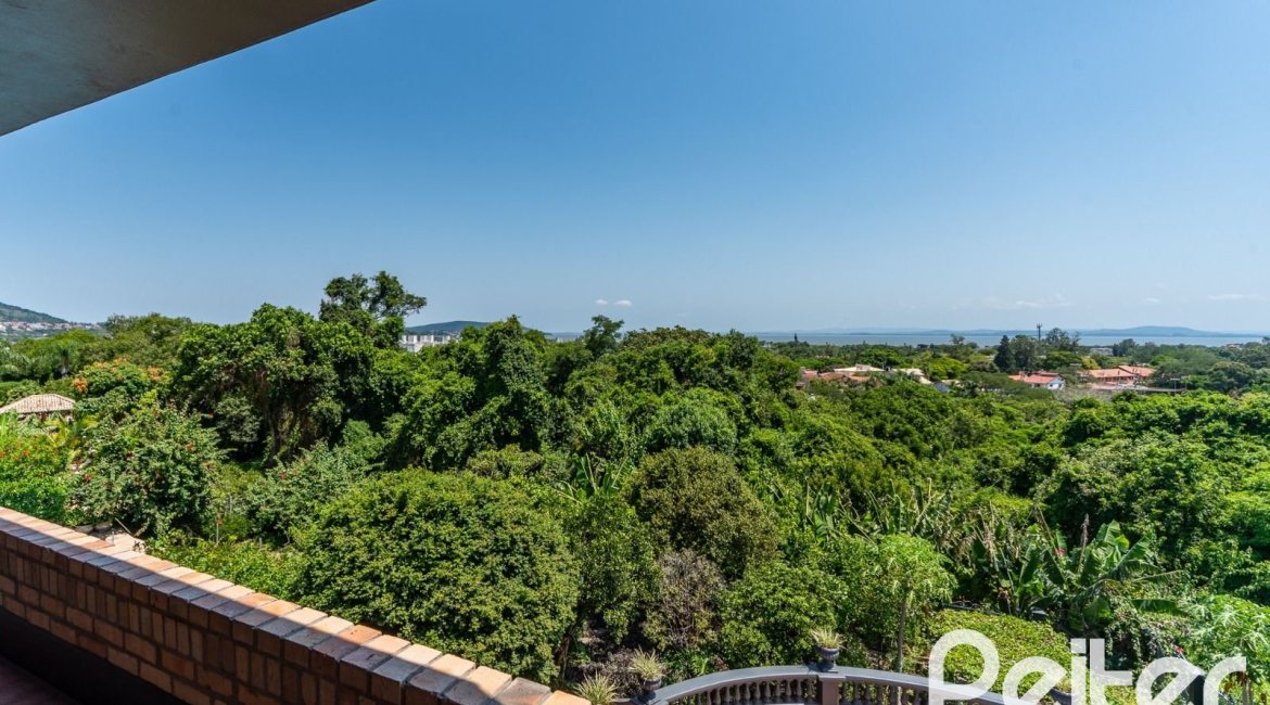 Casa em Condomínio à venda com 459m², 4 dormitórios, 4 suítes, 3 vagas, no bairro Cavalhada em PORTO ALEGRE