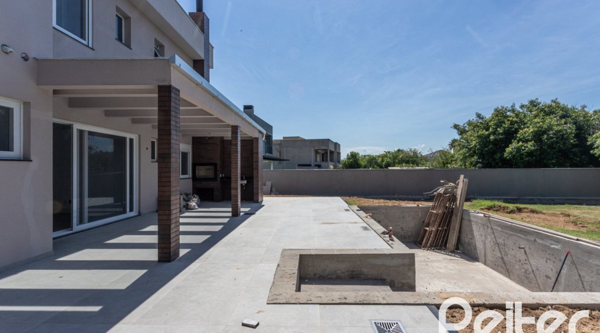 Casa em Condomínio à venda com 566m², 5 dormitórios, 5 suítes, 4 vagas, no bairro Terra Ville em PORTO ALEGRE