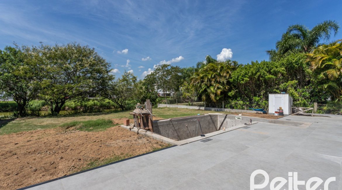 Casa em Condomínio à venda com 566m², 5 dormitórios, 5 suítes, 4 vagas, no bairro Terra Ville em PORTO ALEGRE