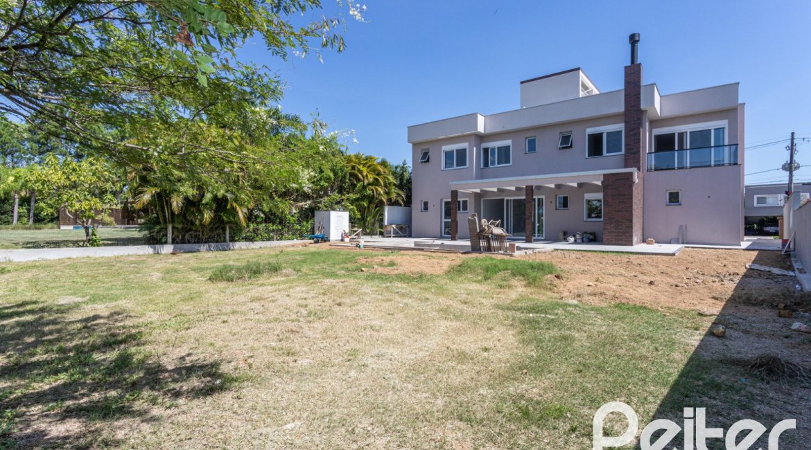 Casa em Condomínio à venda com 566m², 5 dormitórios, 5 suítes, 4 vagas, no bairro Terra Ville em PORTO ALEGRE