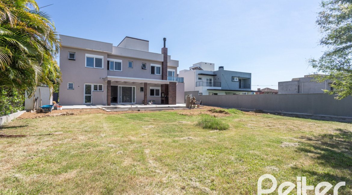 Casa em Condomínio à venda com 566m², 5 dormitórios, 5 suítes, 4 vagas, no bairro Terra Ville em PORTO ALEGRE