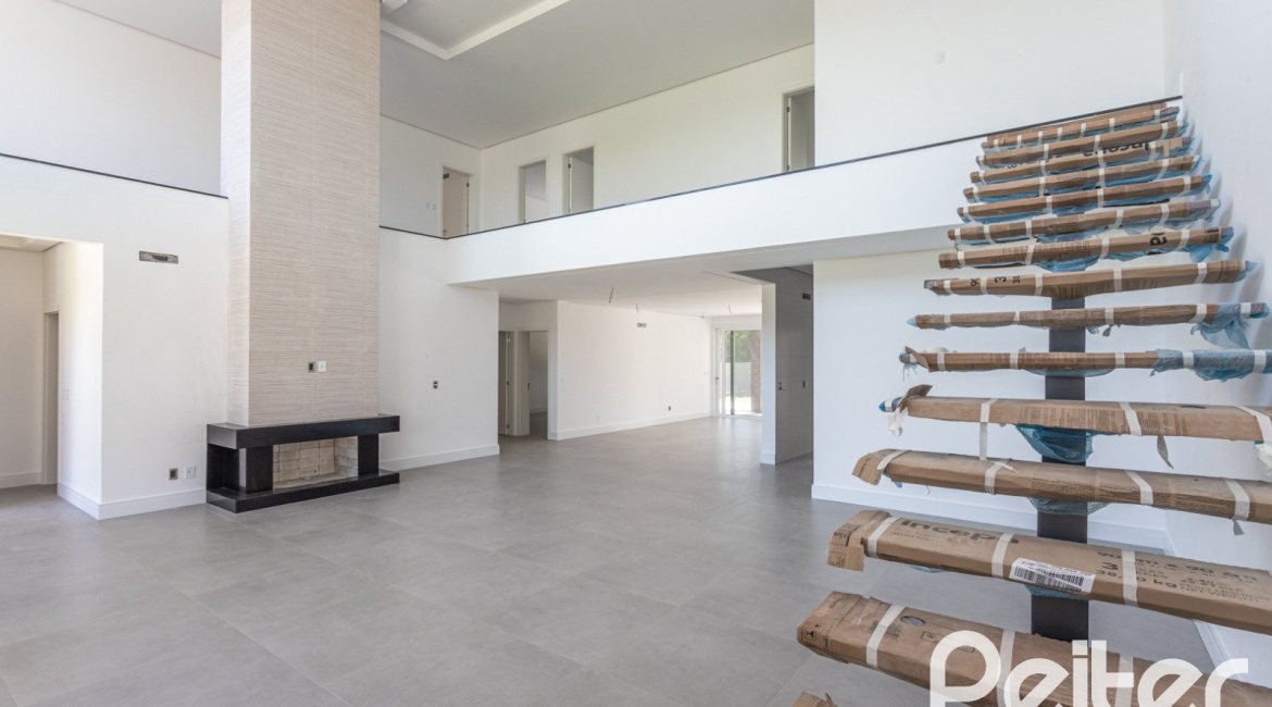 Casa em Condomínio à venda com 566m², 5 dormitórios, 5 suítes, 4 vagas, no bairro Terra Ville em PORTO ALEGRE
