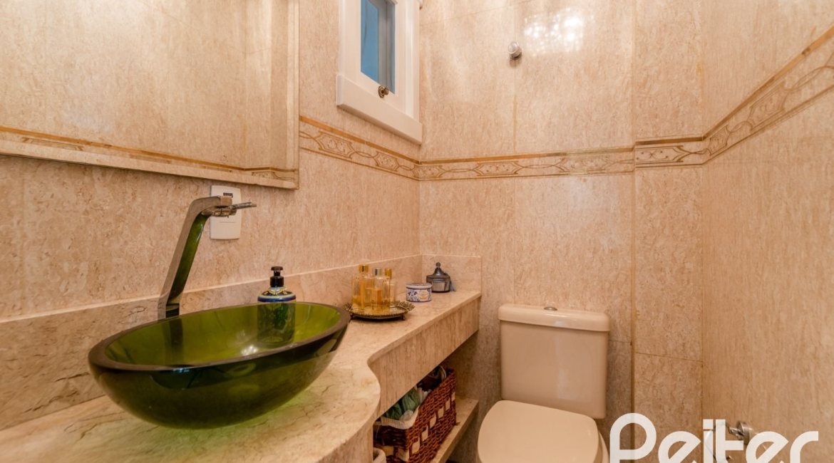 Casa em Condomínio à venda com 416m², 4 dormitórios, 4 suítes, 4 vagas, no bairro Terra Ville em PORTO ALEGRE