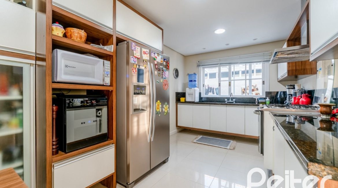 Casa em Condomínio à venda com 416m², 4 dormitórios, 4 suítes, 4 vagas, no bairro Terra Ville em PORTO ALEGRE