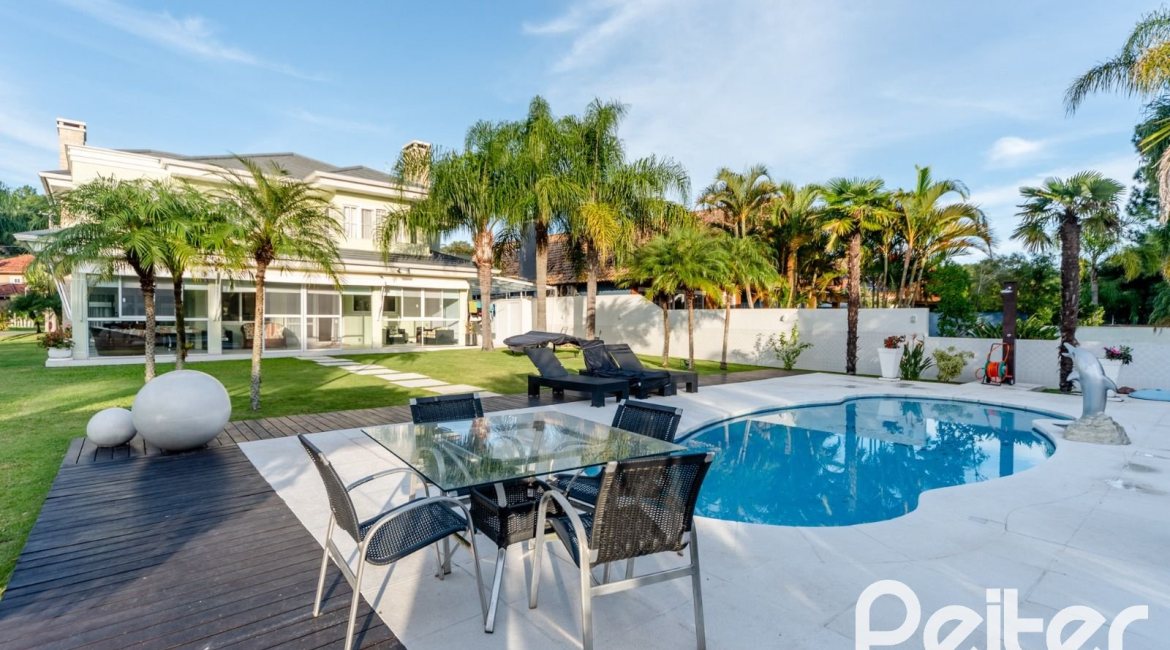 Casa em Condomínio à venda com 416m², 4 dormitórios, 4 suítes, 4 vagas, no bairro Terra Ville em PORTO ALEGRE