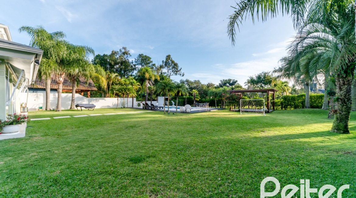 Casa em Condomínio à venda com 416m², 4 dormitórios, 4 suítes, 4 vagas, no bairro Terra Ville em PORTO ALEGRE