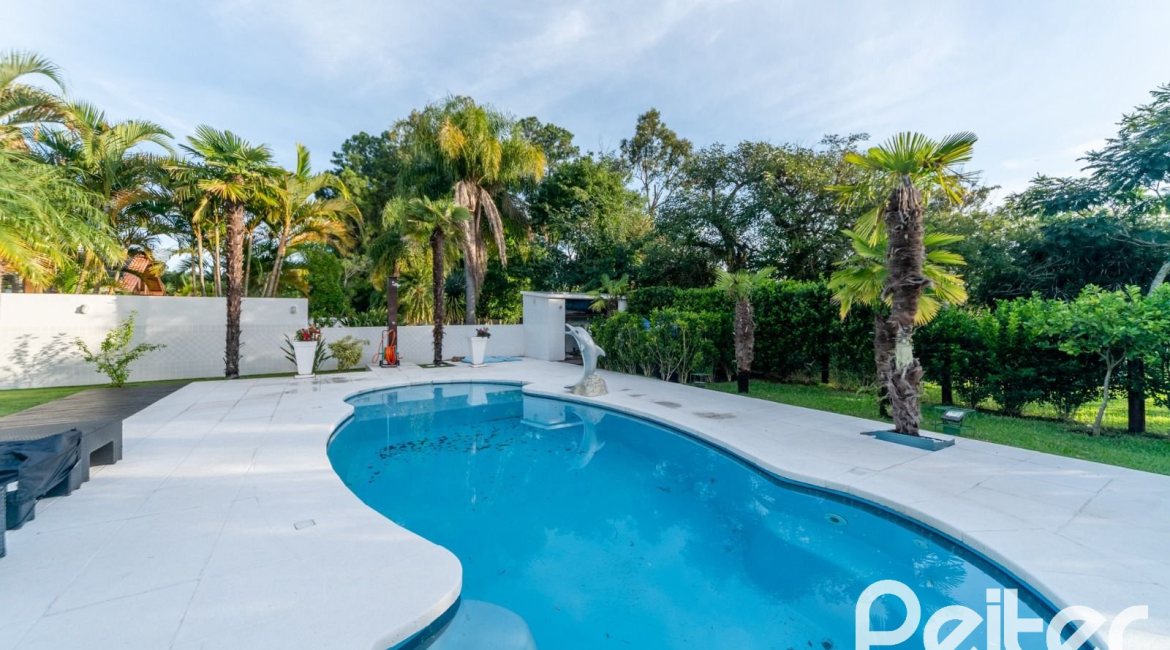 Casa em Condomínio à venda com 416m², 4 dormitórios, 4 suítes, 4 vagas, no bairro Terra Ville em PORTO ALEGRE