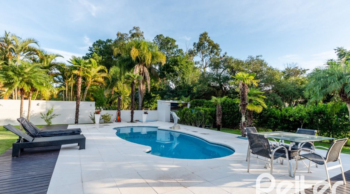 Casa em Condomínio à venda com 416m², 4 dormitórios, 4 suítes, 4 vagas, no bairro Terra Ville em PORTO ALEGRE