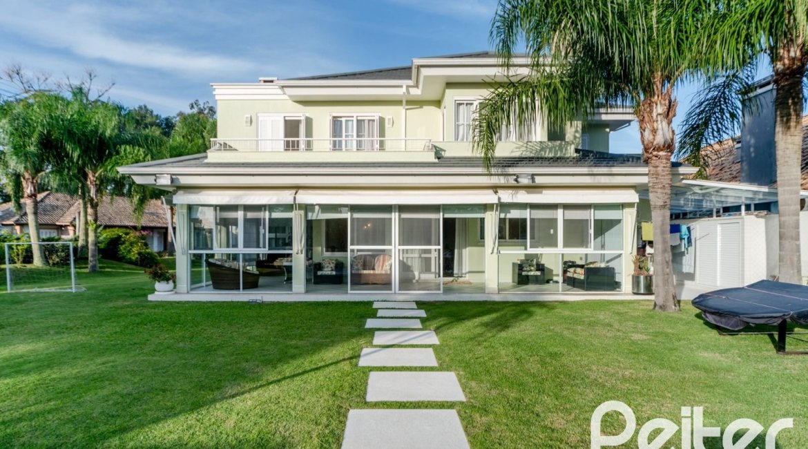 Casa em Condomínio à venda com 416m², 4 dormitórios, 4 suítes, 4 vagas, no bairro Terra Ville em PORTO ALEGRE