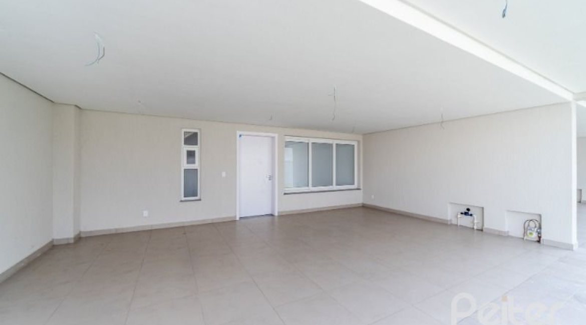 Casa em Condomínio à venda com 306m², 3 dormitórios, 3 suítes, 3 vagas, no bairro Vila Assunção em Porto Alegre