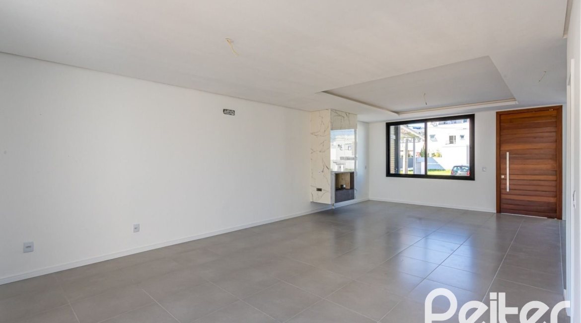 Casa em Condomínio à venda com 164m², 3 dormitórios, 1 suíte, 2 vagas, no bairro Hípica em PORTO ALEGRE