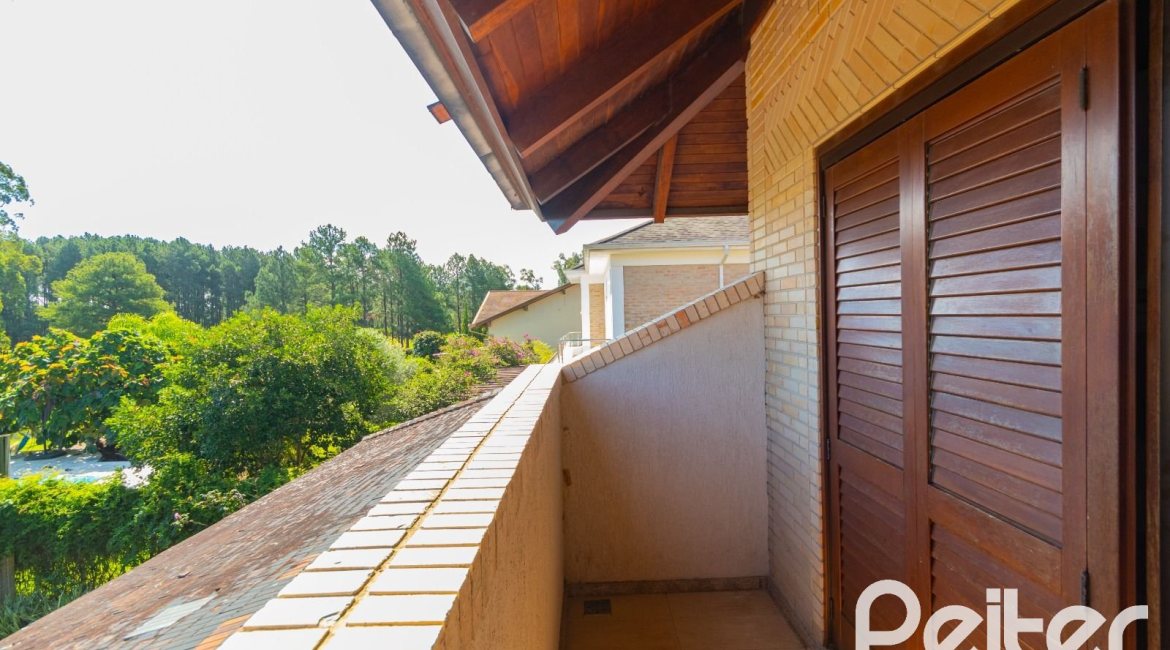 Casa em Condomínio à venda com 600m², 4 dormitórios, 4 suítes, 4 vagas, no bairro Terra Ville em PORTO ALEGRE