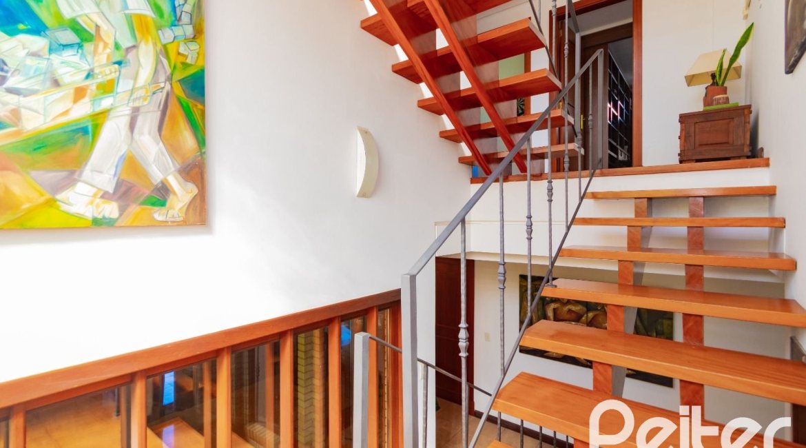 Casa em Condomínio à venda com 600m², 4 dormitórios, 4 suítes, 4 vagas, no bairro Terra Ville em PORTO ALEGRE