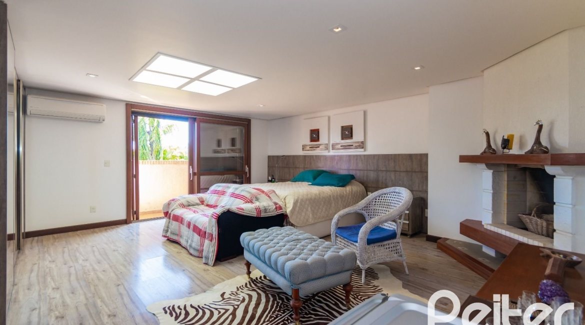 Casa em Condomínio à venda com 600m², 4 dormitórios, 4 suítes, 4 vagas, no bairro Terra Ville em PORTO ALEGRE