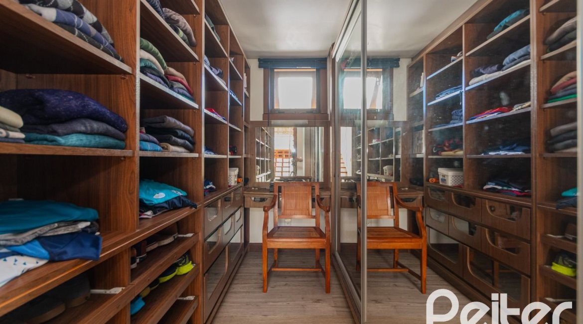 Casa em Condomínio à venda com 600m², 4 dormitórios, 4 suítes, 4 vagas, no bairro Terra Ville em PORTO ALEGRE