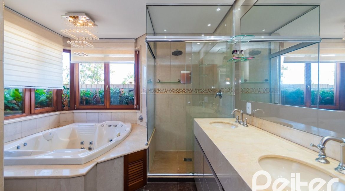 Casa em Condomínio à venda com 600m², 4 dormitórios, 4 suítes, 4 vagas, no bairro Terra Ville em PORTO ALEGRE