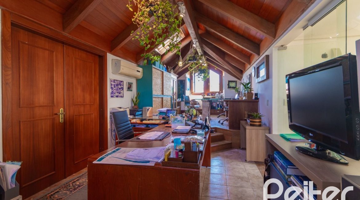 Casa em Condomínio à venda com 600m², 4 dormitórios, 4 suítes, 4 vagas, no bairro Terra Ville em PORTO ALEGRE