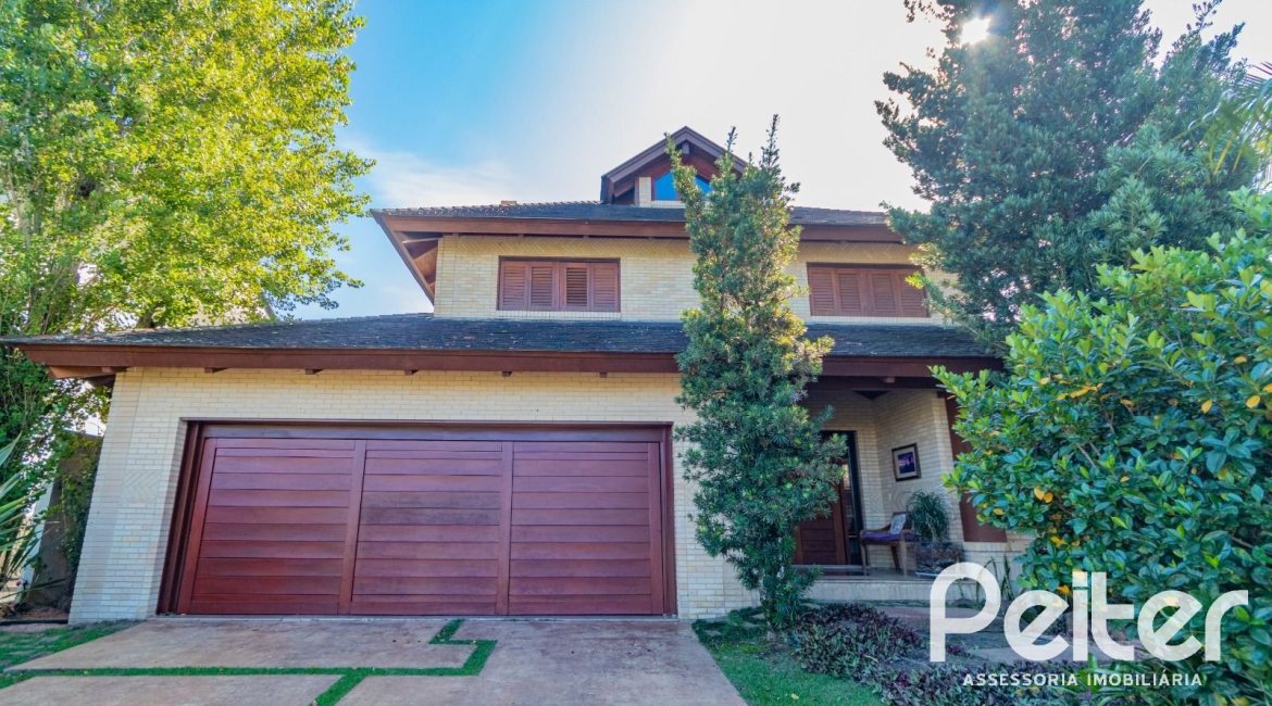 Casa em Condomínio à venda com 600m², 4 dormitórios, 4 suítes, 4 vagas, no bairro Terra Ville em PORTO ALEGRE