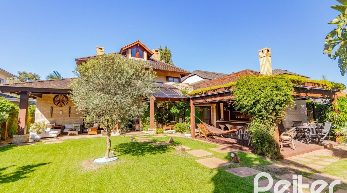 Casa em Condomínio à venda com 600m², 4 dormitórios, 4 suítes, 4 vagas, no bairro Terra Ville em PORTO ALEGRE