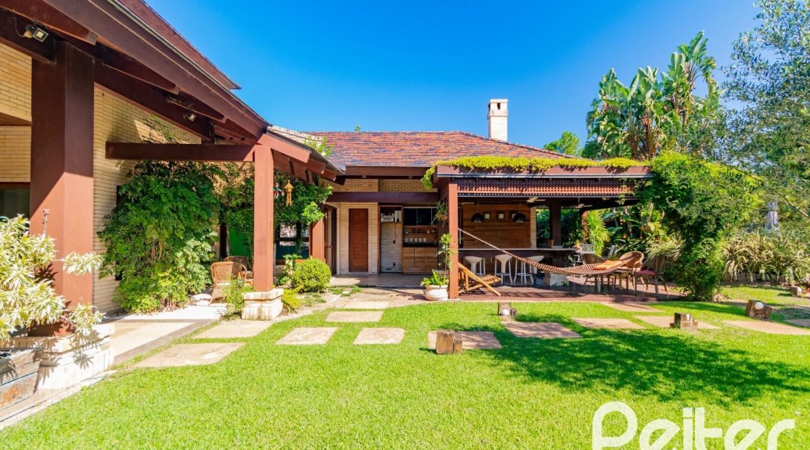 Casa em Condomínio à venda com 600m², 4 dormitórios, 4 suítes, 4 vagas, no bairro Terra Ville em PORTO ALEGRE