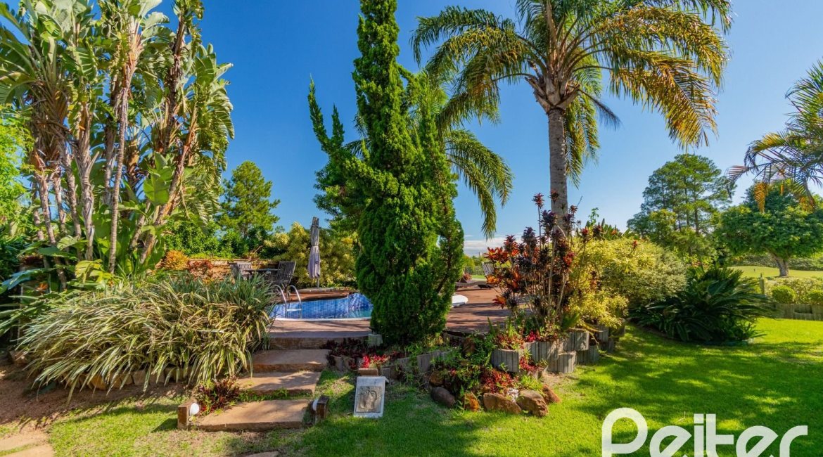 Casa em Condomínio à venda com 600m², 4 dormitórios, 4 suítes, 4 vagas, no bairro Terra Ville em PORTO ALEGRE